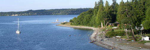 Boat sailing in Admiralty Inlet on the Olympic Peninsula